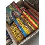 A box of children's annuals.