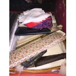 A box containing 5 vintage fans, hankerchiefs, etc