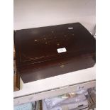 A brass inlaid lockable wooden jewellery box with keys.