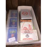 An album of Match Attax collectors cards and a box of Man Utd memorabilia inc membership booklets.