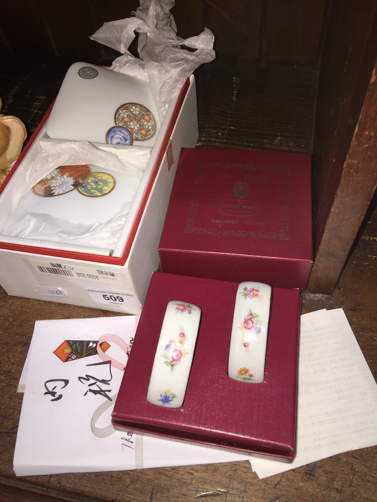Dresden china boxed serciette rings and two Japanese boxed caskets