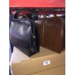 2 Mappin & Webb lizard skin handbags - 1 black and 1 brown.