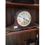 A mantel clock.