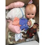 A box of dolls to include late 19th century.