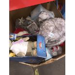 A large box of soft toys