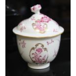 A Worcester porcelain sucrier, circa 1780, with flower head finial to lid, pink floral designs and