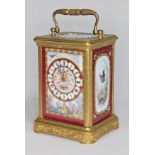 A French late 19th century gilt brass and porcelain repeater carriage clock, the hand painted dial