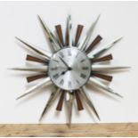 A retro Metamec sunburst clock, diam. 60cm.