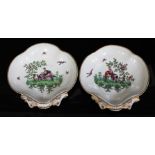 A pair of Worcester porcelain dishes, circa 1770, of shell shape and each with hand painted