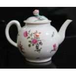 A Worcester porcelain teapot, circa 1780, of typical form with flower head finial to lid and hand