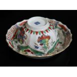 A Worcester porcelain tea bowl and saucer, 18th century, decorated with Dragons in Compartments