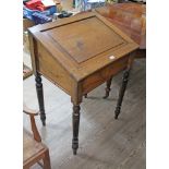 A late Victorian stained pine clerks desk, height 103cm, width 71.5cm and depth 54cm. General wear