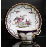 A Worcester cup and saucer of fluted/ribbed form, circa 1775-80, painted in the workshop of James