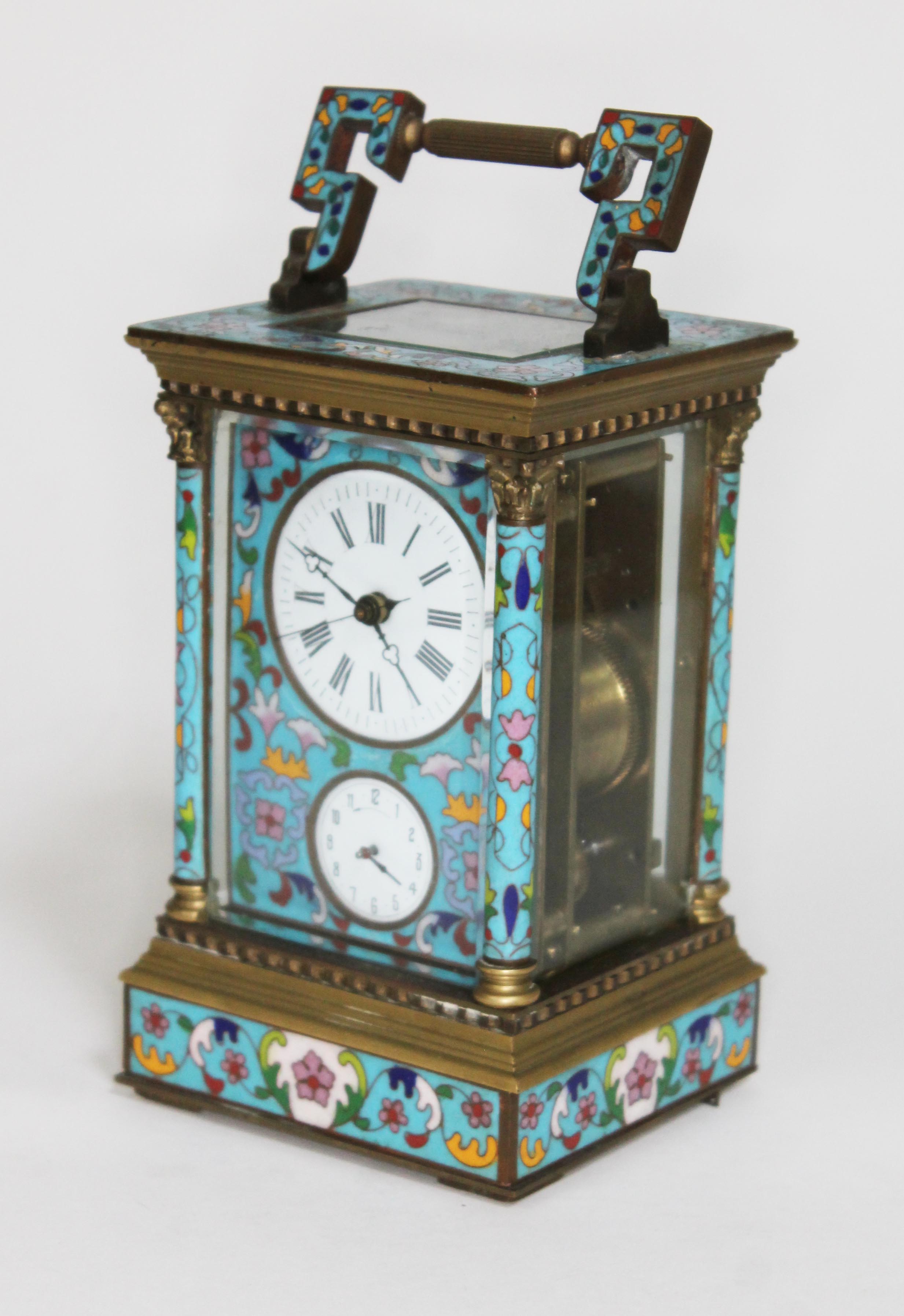 A reproduction cloisonne repeater carriage clock with alarm, height 21cm. Condition - as found.