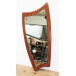 A retro teak asymmetric mirror, length 82cm.