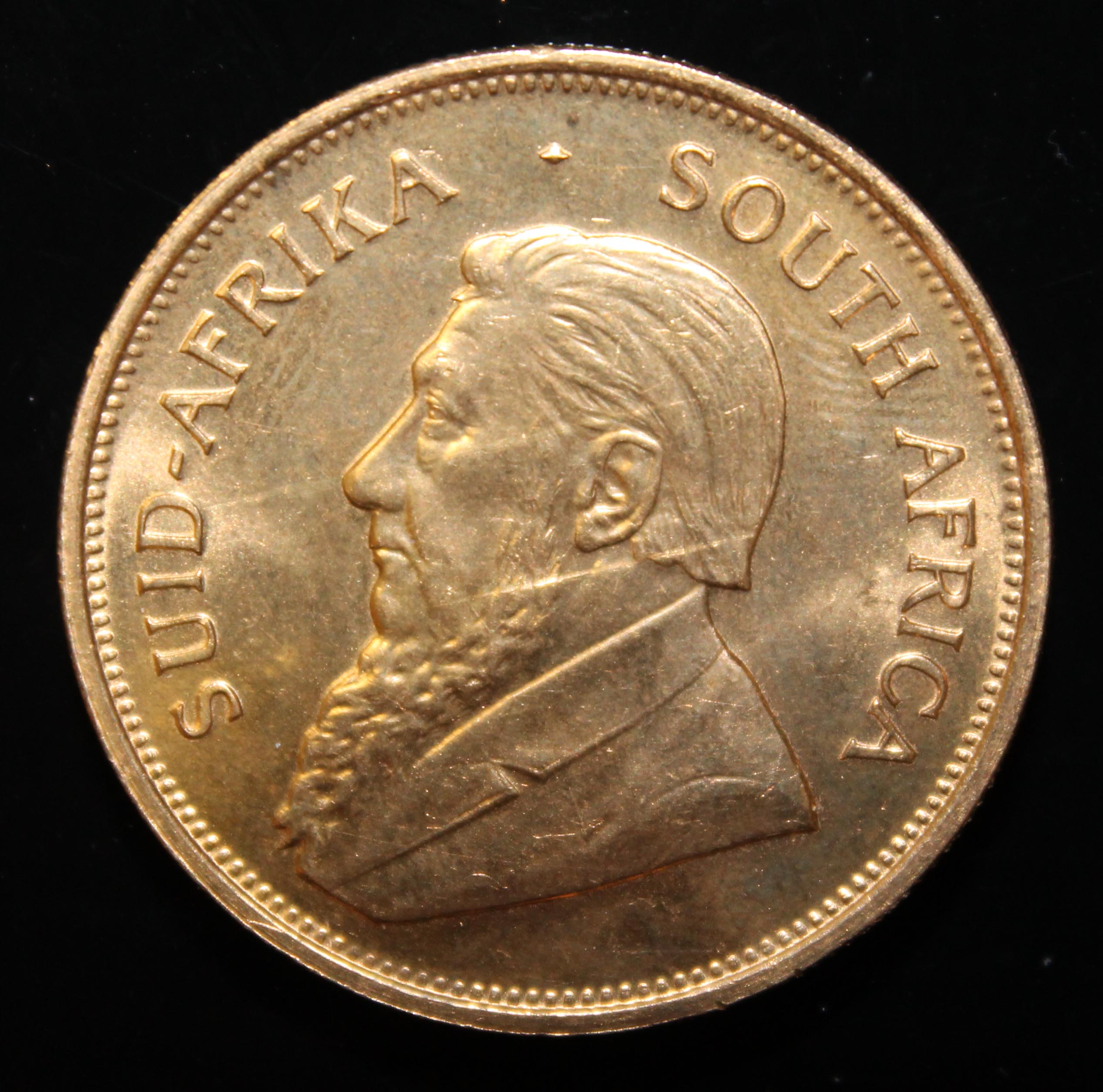 South Africa, 1975 Krugerrand, 1 oz. fine gold (91.67%) ONLY 10% BUYER'S PREMIUM (INCLUSIVE OF