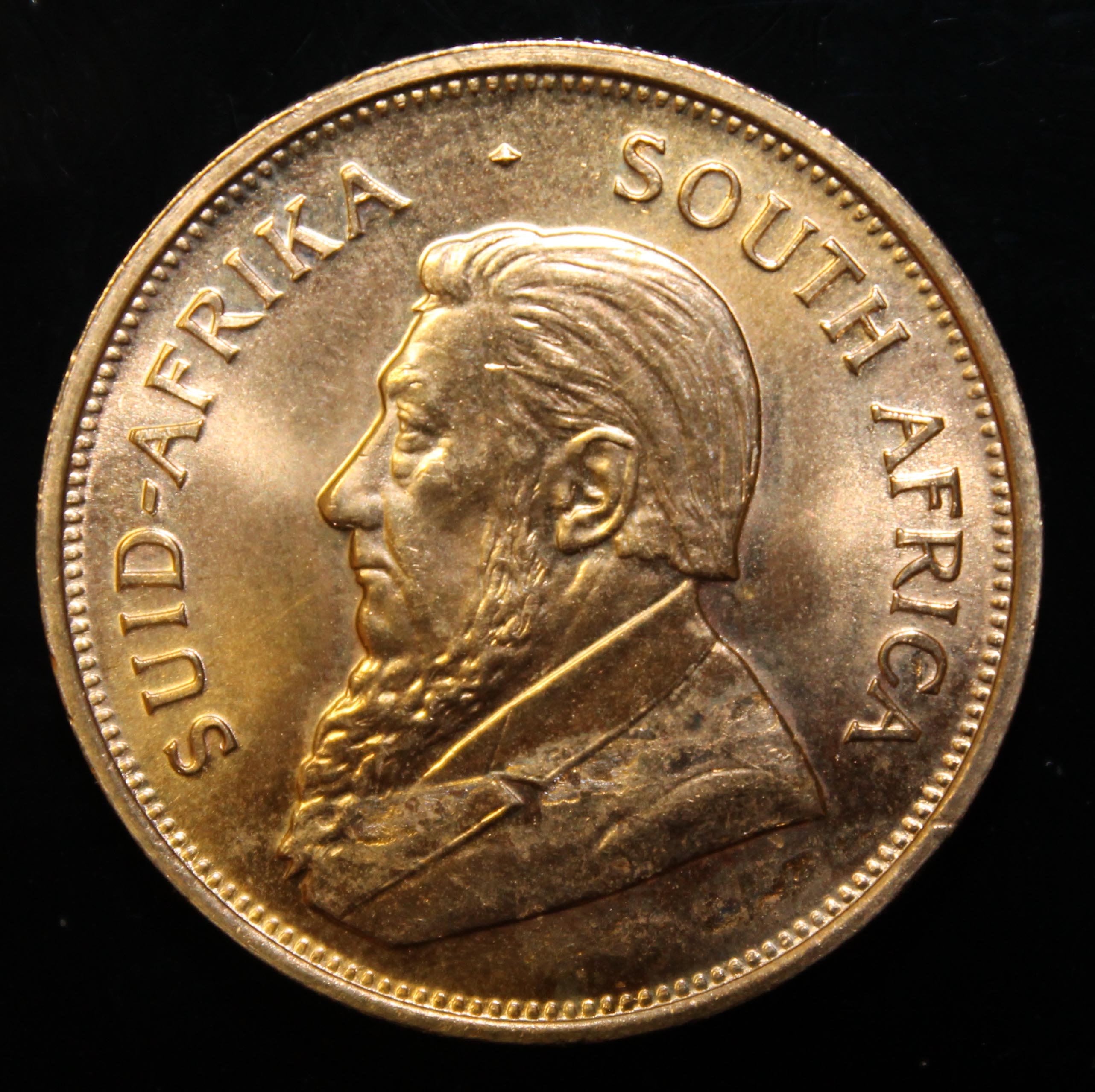 South Africa, 1975 Krugerrand, 1 oz. fine gold (91.67%) ONLY 10% BUYER'S PREMIUM (INCLUSIVE OF