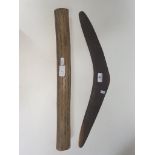 A vintage Australian ethnic Aborigine boomerang & rain stick.