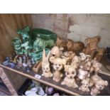 A large collection of mixed Sylvac ornaments and a group of Wade Whimsies