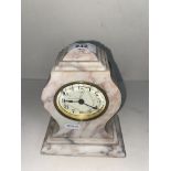 A German 8 day marble clock