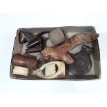 A box of mainly treen including two wooden whistles, a pipe carved as a horse's head, an olive, wood