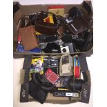 2 boxes of cameras and accessories to include Tele-Flash Nova, Kodak Instamatic camera, a 1920s