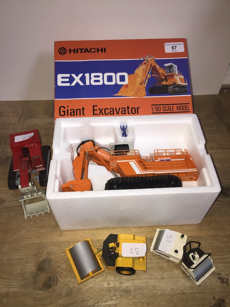 An Hitachi EX1800 Giant Excavator model in box, an Ingersoll-rand SP-60 model, an Ingersoll-rand