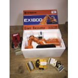 An Hitachi EX1800 Giant Excavator model in box, an Ingersoll-rand SP-60 model, an Ingersoll-rand