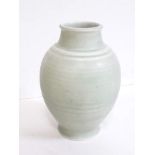 A Pilkington's Royal Lancastrian mint green ribbed vase number 3014, height 22cm.