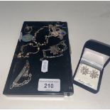 9 vintage sterling silver jewellery items including brooches and bracelets.