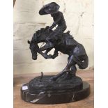 A Franklin Mint repro metal figure on marble base after Frederic Remington, A cowboy on horse
