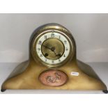 A German art-deco brass case clock with key and pendulum