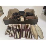 Box containing various items of woodenware, boxed knives and a two strand faux pearl necklace.