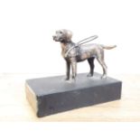 A silver plated Guide Dogs trophy.