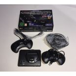 A Sega mega drive mini with 2 control pads in box, appears unused.