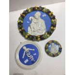 Three religious plaques