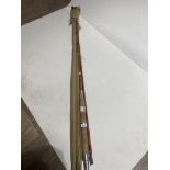 Two vintage three piece cane fly fishing rods, one in bag.