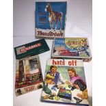 A selection of games to include Hats Off, Action figure, Scrabble, Johnny West Thunderbolt horse,