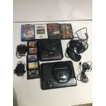 Box containing a Sega Megadrive and a Sega Megadrive II consoles and power cables. 2 Megadrive