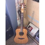 An LAG Tramontane T66D Dreadnought steel strung acoustic guitar, fitted with a Fishman Neo-D pickup,