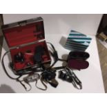 A pair of Carl Zeiss Jena Jenoptem 10 x 50W binoculars unused in case and boxed. A hard camera