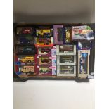 A box of model vehicles including Vanguards, Burago etc - all boxed