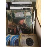 A collection of records to include Bob Dylan, The Police and T.Rex etc.