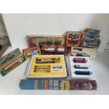A box of boxed vintage diecast models to include, Matchbox, EFE, Corgi and burago etc.