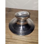 A hallmarked silver capstan inkwell, sponsor's initials 'B&M', Birmingham 1923, diam. 15cm.