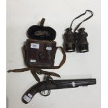 A Ketland & Co. pistol and a pair of Picard Petot Liénard binoculars in case.