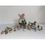 A box of Wade whimsies including Disney & Nat West pig money box.