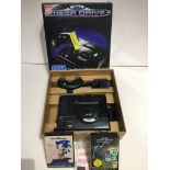 A Sega Megadrive console in original box, with 1 hand controller, power cable and 2 games - Sonic