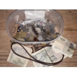 A tub of coins, bank notes and costume jewellery.