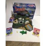 A Matchbox Thunderbirds Tracy Island with electronic rocket sounds and voices, in original box. Also